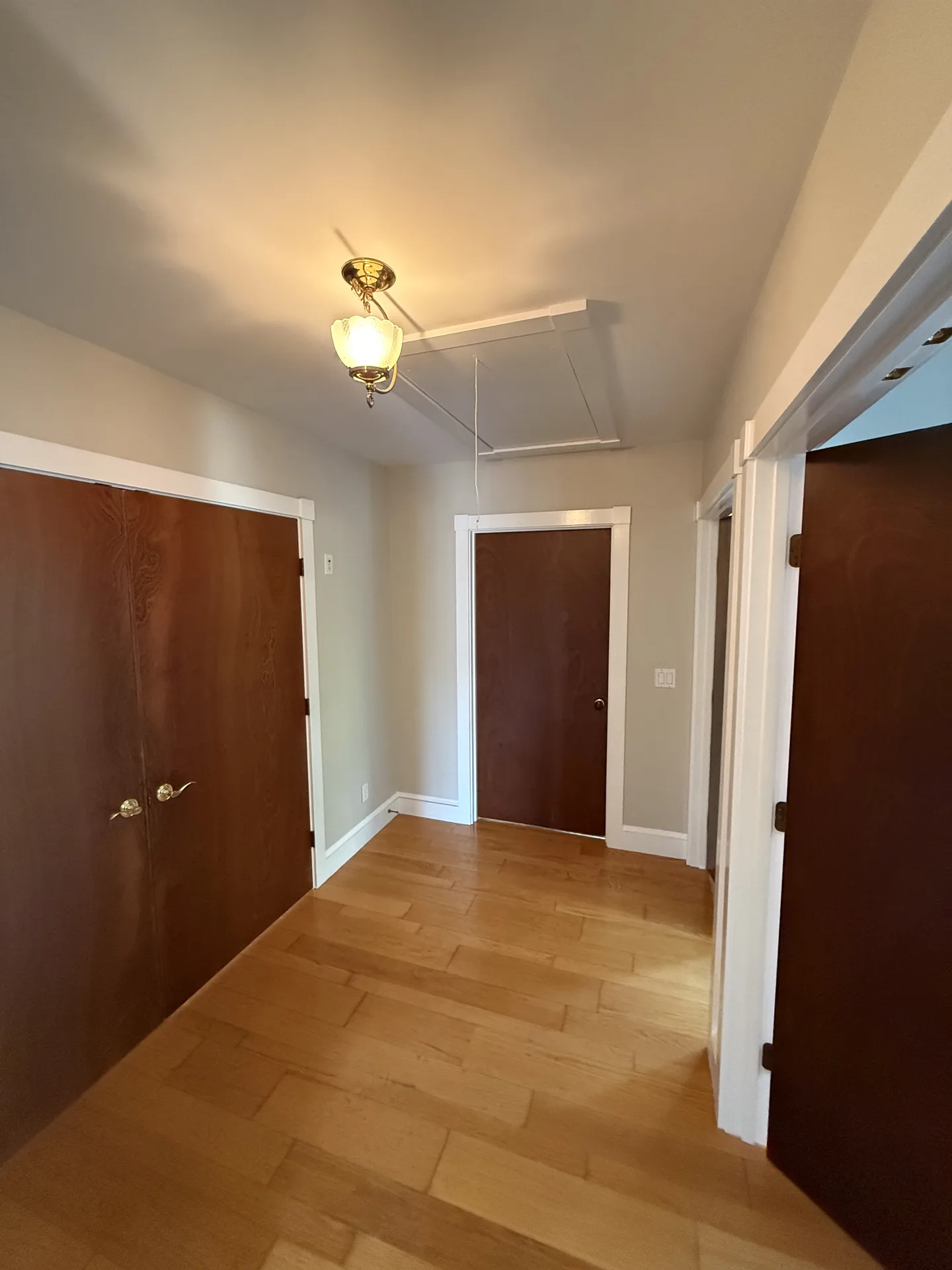 Upstairs landing with painted walls and clean white trim