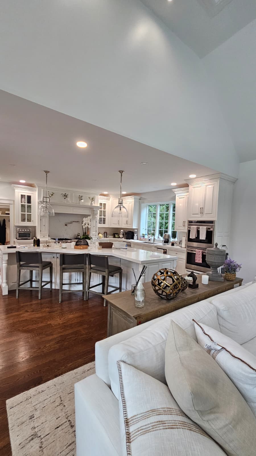 White kitchen cabinets and island interior painting