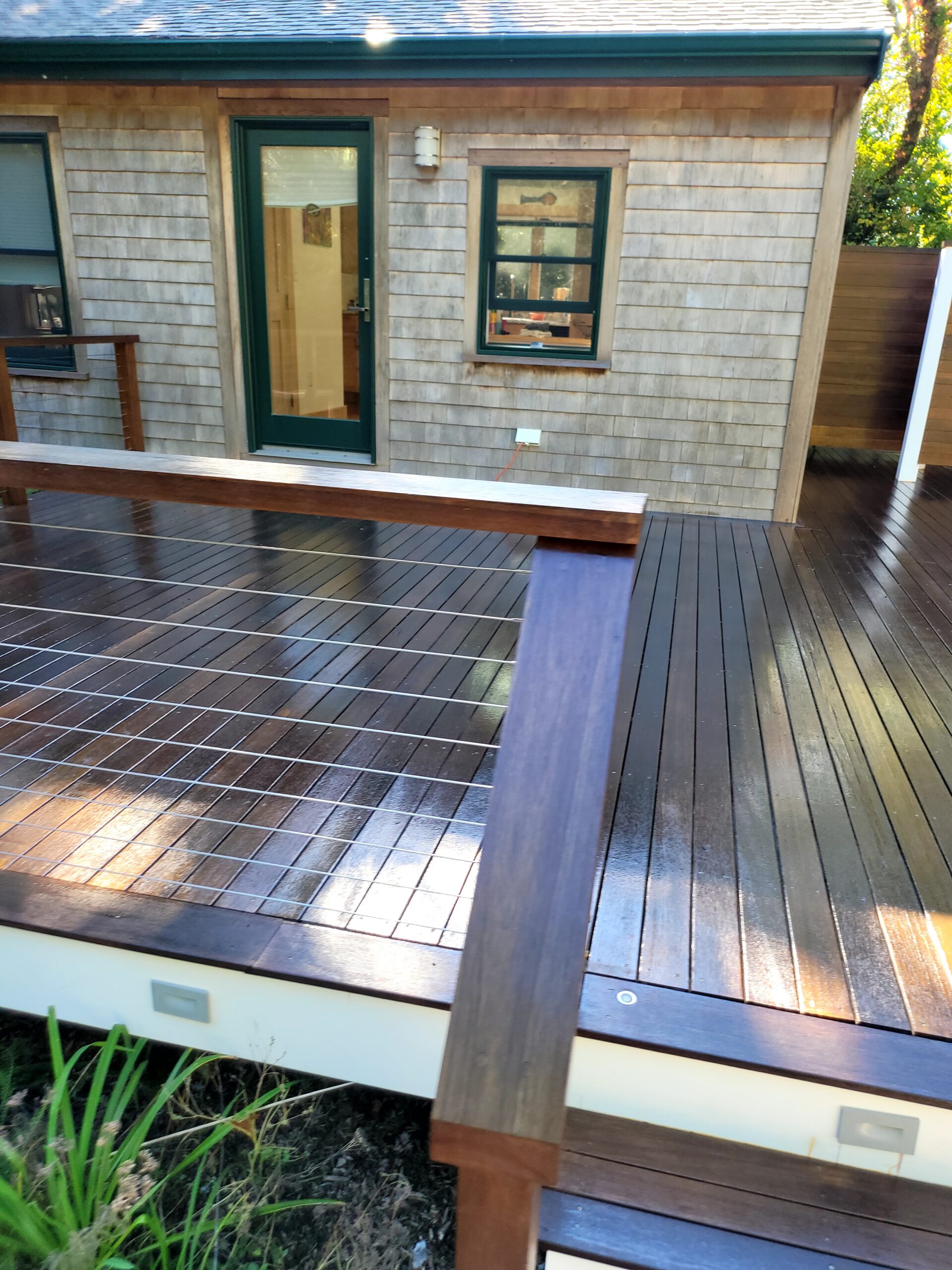 Waterfront deck with fresh finish, Massachusetts
